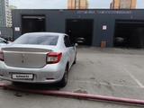 Renault Logan 2014 года за 2 300 000 тг. в Астана – фото 4