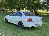 Nissan Almera Classic 2010 года за 3 100 000 тг. в Астана – фото 2