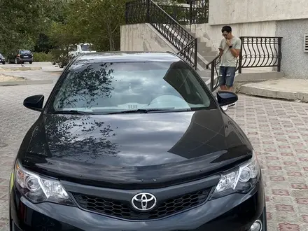 Toyota Camry 2013 года за 9 200 000 тг. в Актобе