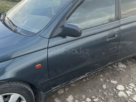 Toyota Carina E 1997 года за 2 200 000 тг. в Шымкент – фото 2