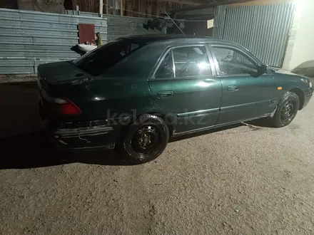 Mazda 626 1997 года за 1 700 000 тг. в Астана – фото 4