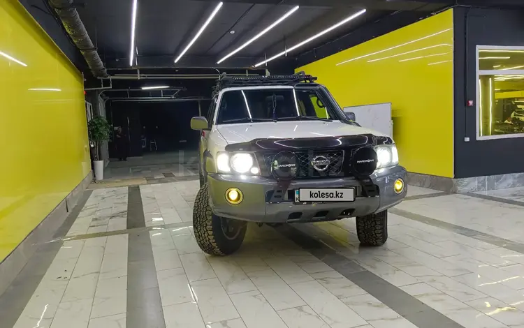 Nissan Patrol 2012 года за 23 000 000 тг. в Астана