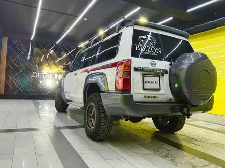 Nissan Patrol 2012 года за 23 000 000 тг. в Астана – фото 42