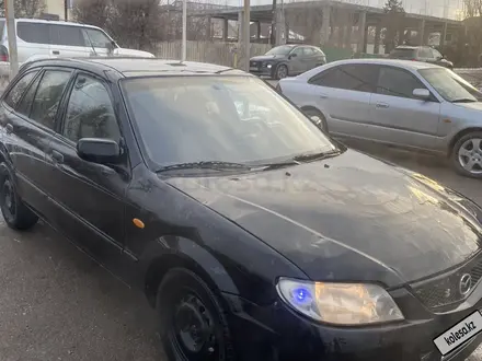Mazda 323 2001 года за 850 000 тг. в Алматы – фото 2