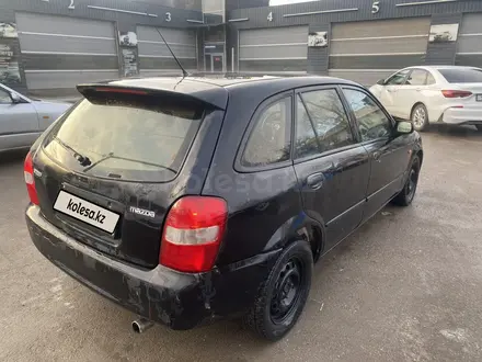 Mazda 323 2001 года за 850 000 тг. в Алматы – фото 4