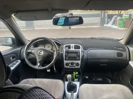 Mazda 323 2001 года за 850 000 тг. в Алматы – фото 5