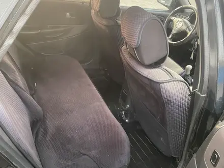 Mazda 323 2001 года за 850 000 тг. в Алматы – фото 6