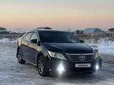 Toyota Camry 2014 годаfor8 370 000 тг. в Алматы