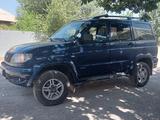УАЗ Patriot 2013 года за 3 500 000 тг. в Жаркент – фото 2