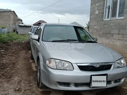 Mazda Familia 1998 года за 1 500 000 тг. в Шымкент – фото 3