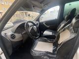 Renault Logan 2011 года за 1 350 000 тг. в Астана – фото 4