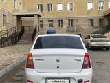 Renault Logan 2011 года за 1 350 000 тг. в Астана – фото 3