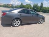 Toyota Camry 2014 года за 5 200 000 тг. в Уральск – фото 3