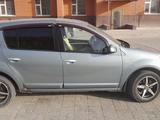 Renault Sandero 2013 года за 3 800 000 тг. в Актау – фото 3