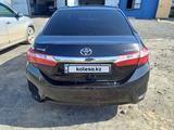 Toyota Corolla 2014 года за 6 800 000 тг. в Актобе – фото 3