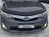 Toyota Camry 2014 годаfor9 850 000 тг. в Шымкент