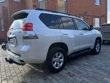 Toyota Land Cruiser Prado 2012 года за 13 900 000 тг. в Актобе – фото 4