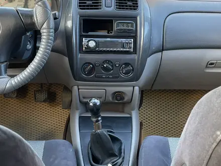 Mazda 323 2003 года за 1 950 000 тг. в Актобе – фото 10