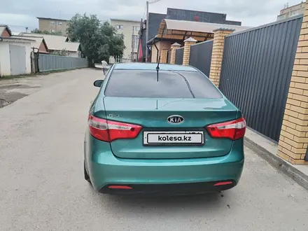 Kia Rio 2012 года за 2 585 000 тг. в Актобе – фото 7