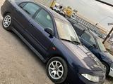 Mitsubishi Carisma 1997 года за 1 500 000 тг. в Астана – фото 2