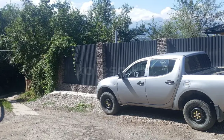 Mitsubishi L200 2012 года за 4 300 000 тг. в Алматы