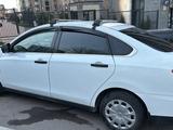 Nissan Almera 2014 года за 3 034 000 тг. в Алматы – фото 2