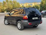 Hyundai Santa Fe 2002 года за 3 000 000 тг. в Актобе – фото 3