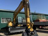 Экскаватор колесный в Актау