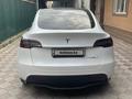 Tesla Model Y 2023 года за 21 500 000 тг. в Алматы – фото 6
