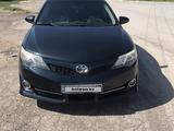 Toyota Camry 2014 годаүшін9 500 000 тг. в Шымкент