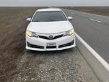 Toyota Camry 2014 года за 6 700 000 тг. в Атырау