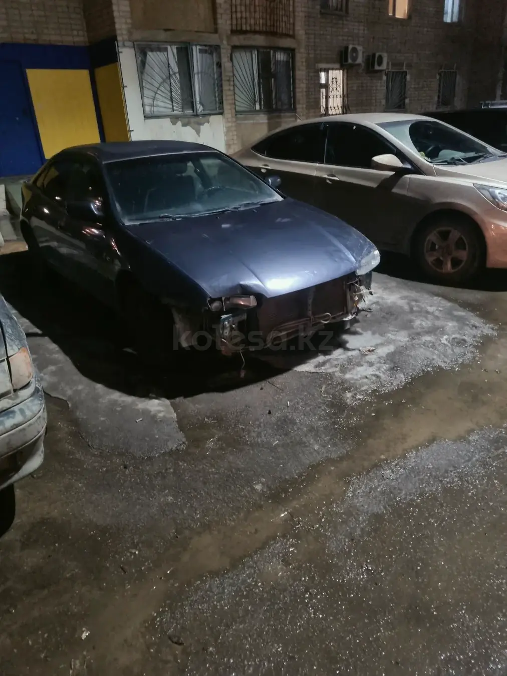 Mazda 323, 1998