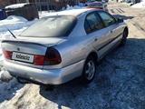 Mitsubishi Carisma 1998 года за 1 300 000 тг. в Астана – фото 4