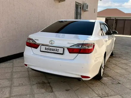 Toyota Camry 2015 года за 11 500 000 тг. в Жанаозен – фото 2