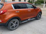 Kia Sportage 2012 года за 6 500 000 тг. в Караганда – фото 2