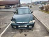 Mazda 323 2000 года за 1 800 000 тг. в Шымкент – фото 4