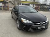 Toyota Camry 2015 года за 7 500 000 тг. в Атырау – фото 2
