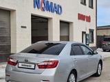 Toyota Camry 2013 года за 10 500 000 тг. в Жанаозен – фото 4