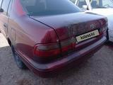 Toyota Carina E 1997 года за 900 000 тг. в Байконыр – фото 4