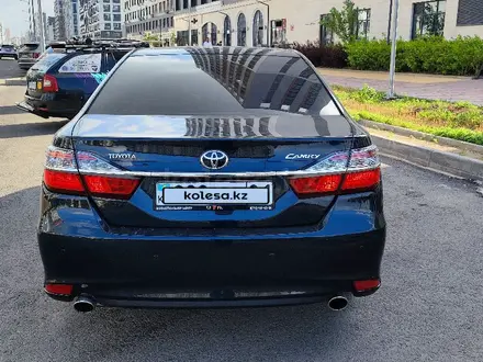 Toyota Camry 2014 года за 9 900 000 тг. в Астана – фото 4