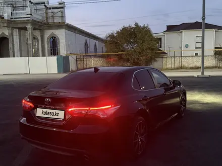 Toyota Camry 2019 года за 14 000 000 тг. в Жанаозен