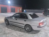 Mitsubishi Carisma 2001 годаүшін1 750 000 тг. в Актобе