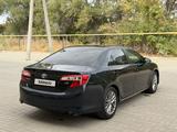 Toyota Camry 2013 года за 7 300 000 тг. в Актобе – фото 5