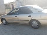 Mazda 323 1995 года за 2 000 000 тг. в Актау – фото 2
