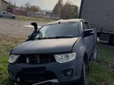 Mitsubishi L200 2014 года за 4 500 000 тг. в Шымкент