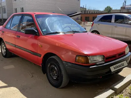 Mazda 323 1993 года за 950 000 тг. в Уральск – фото 4