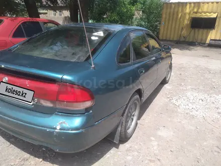 Mazda 626 1992 года за 1 400 000 тг. в Мерке – фото 7