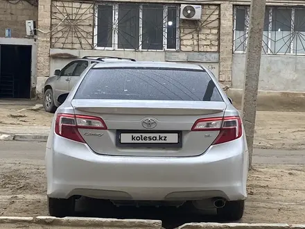 Toyota Camry 2013 года за 9 200 000 тг. в Жанаозен – фото 4