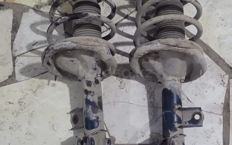 Kia Cerato 2012 год передний амортизатор правый левый за 1 000 тг. в Алматы