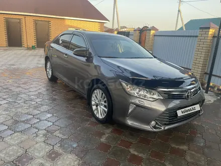 Toyota Camry 2015 года за 10 500 000 тг. в Уральск – фото 19